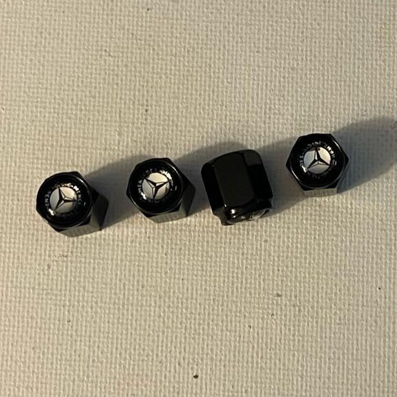 Mercedes Benz Logo valve Stem caps in black set of 4 NWT - Picture 1 of 4